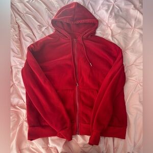Red solid zip up drawstring hoodie.